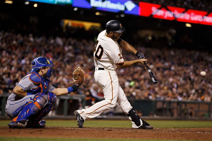 SAN FRANCISCO, CA - AUGUST 18: Madison Bumgarner #40 of the San Francisco Giants hits a two run home run against the New York Mets during the fourth inning at AT&T Park on August 18, 2016 in San Francisco, California. (Photo by Jason O. Watson/Getty Images)