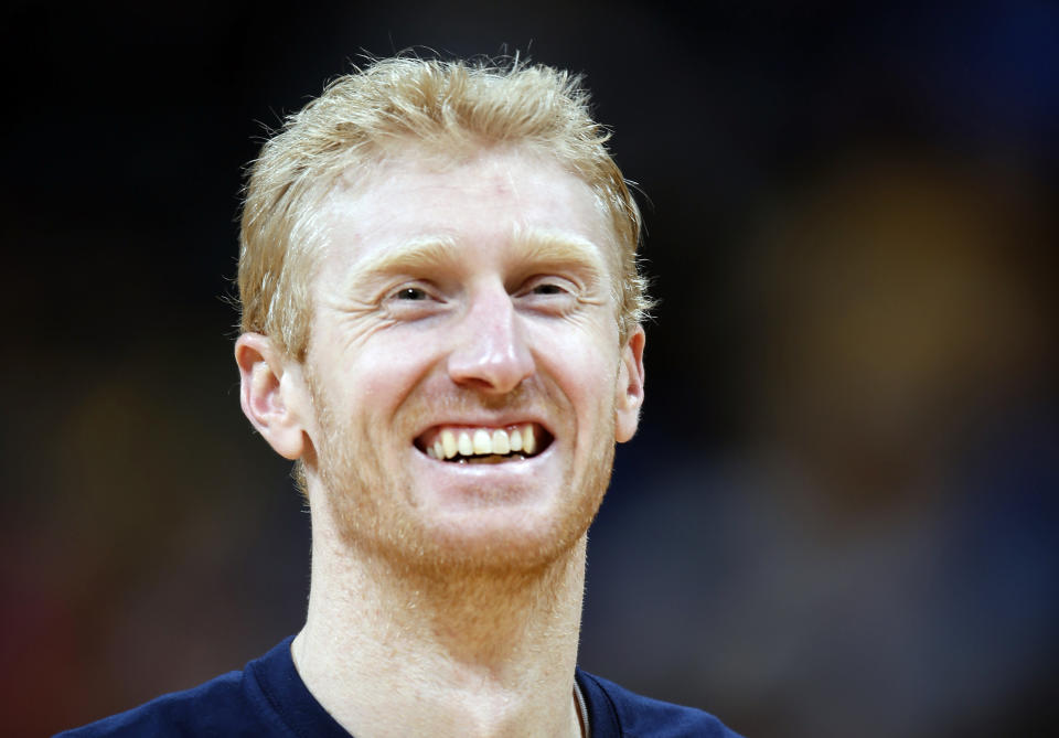 FILE - Indiana Pacers forward Chase Budinger (10) smiles during the second half of an NBA basketball game Sunday, Jan. 17, 2016, in Denver. After a seven-year career in the NBA, Budinger still had some goals left on his dream board. It will be beach volleyball – not basketball – that eventually landed him on Team USA. Budinger, who didn’t start playing regularly on the beach until after his NBA career ended, qualified this month for the Summer Games with partner Miles Evans and both will be making their Olympic debuts in Paris.(AP Photo/David Zalubowski, File)