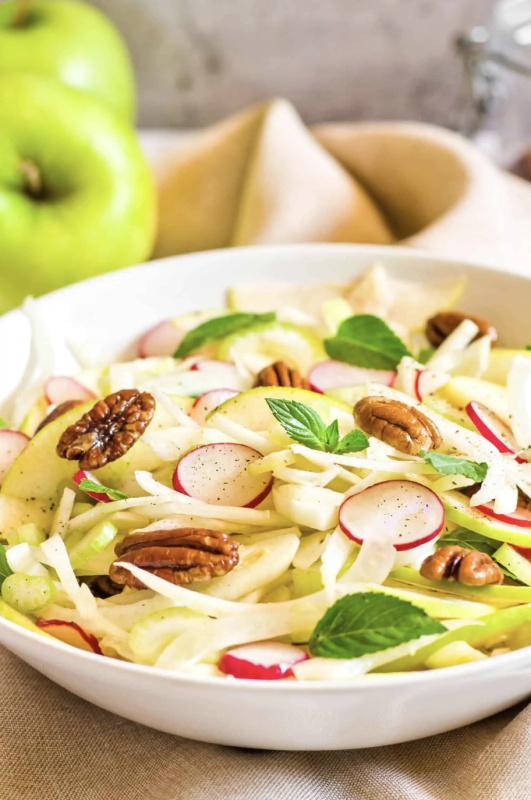 <p>Dish by Dish</p><p>This 10-minute fennel and apple salad is a healthy side dish for Thanksgiving and the holidays. Gluten-free, dairy-free and vegan too!</p><p><strong>Get the recipe: <a href="https://www.dishbydish.net/fennel-and-apple-salad/" rel="nofollow noopener" target="_blank" data-ylk="slk:Fennel and Apple Salad;elm:context_link;itc:0;sec:content-canvas" class="link ">Fennel and Apple Salad</a></strong></p>