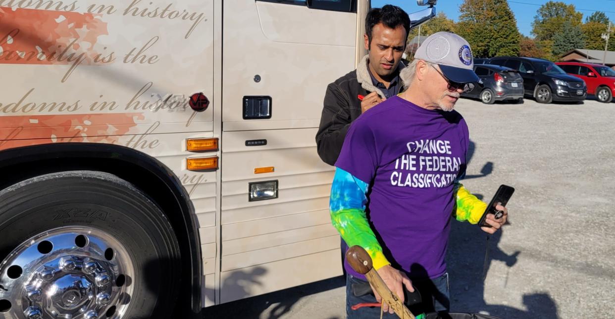 Republican Presidential Candidate Vivek Ramaswamy autographs the shirt of John Fenner, of Ottumwa, after a campaign stop in Oskaloosa on Sat. Oct. 21, 2023. Ramaswamy signaled he supported medical cannabis use for veterans on Saturday.