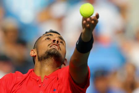 Aug 20, 2017; Mason, OH, USA; Nick Kyrgios (AUS) serves against Grigor Dimitrov (BUL) in the finals during the Western and Southern Open at the Lindner Family Tennis Center. Mandatory Credit: Aaron Doster-USA TODAY Sports