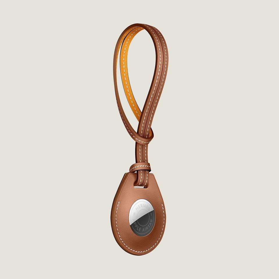 <p><a href="https://www.hermes.com/us/en/product/apple-airtag-hermes-bicolor-bag-charm-H0008001vAA00/" rel="nofollow noopener" target="_blank" data-ylk="slk:Shop Now;elm:context_link;itc:0;sec:content-canvas" class="link ">Shop Now</a></p><p>AirTag Holder</p><p>$299.00</p>