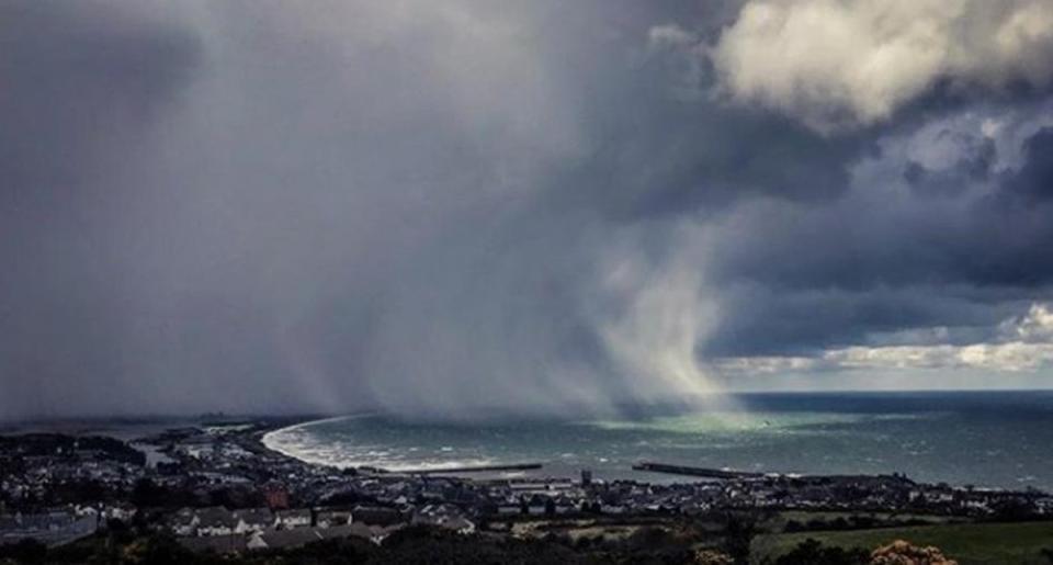 Storm clouds over Dublin Bay (PA)