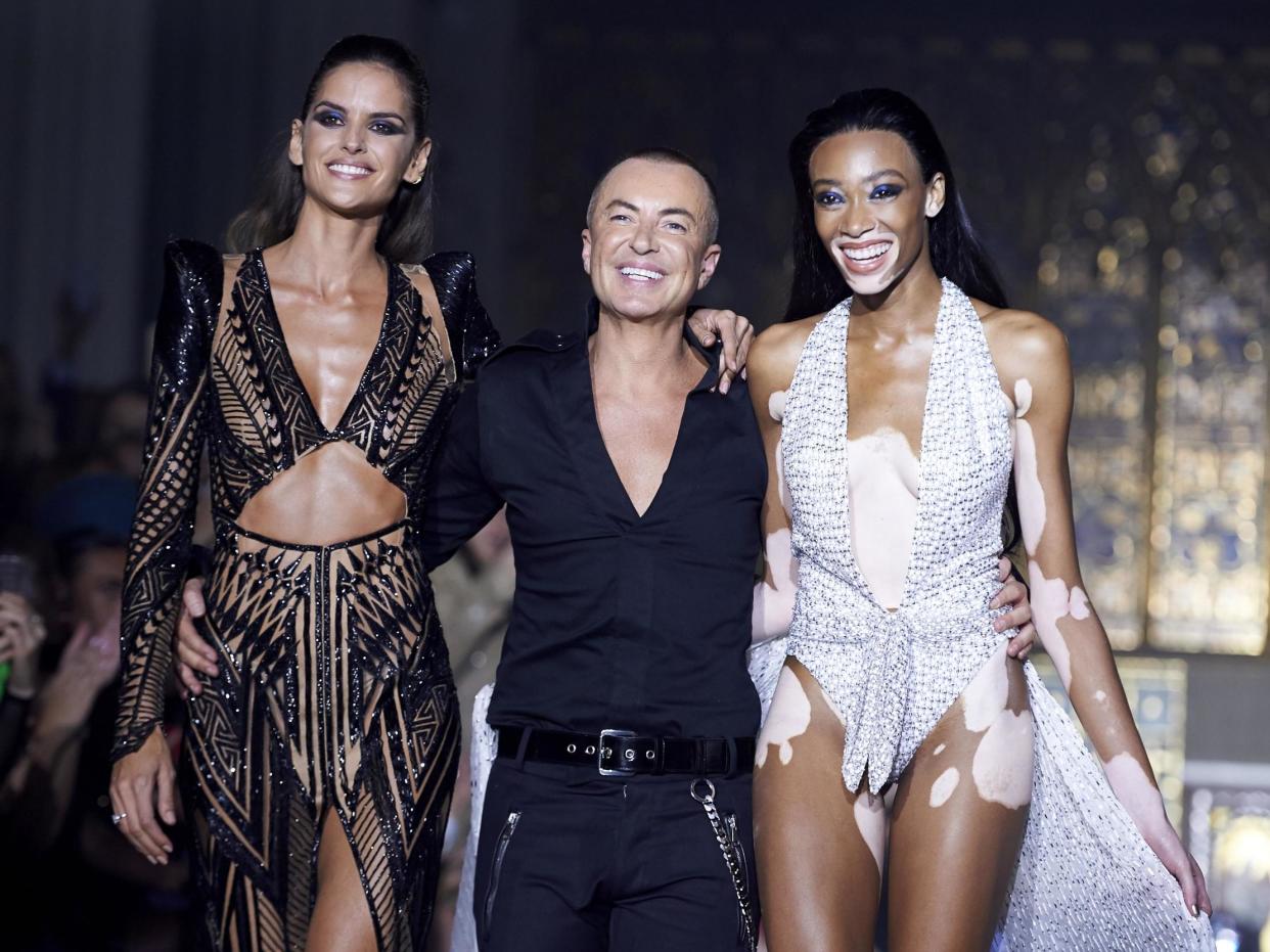 Brazilian model Izabel Goulart, fashion designer Julien Macdonald and Canadian model Winnie Harlow are applauded at London Fashion Week 2018 (15 September 2018): Getty Images