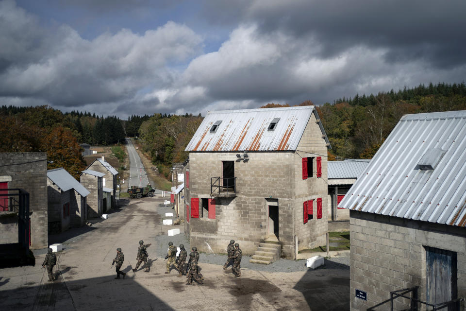 Ukrainian infantrymen train with French soldiers to learn combat skills, in France, Tuesday, Nov. 7, 2023. With the full-scale war grinding into a second winter, and casualties already counted in the hundreds of thousands continuing to mount on both sides, the training has become crucially important for Ukraine's chances of victory. (AP Photo/Laurent Cipriani)