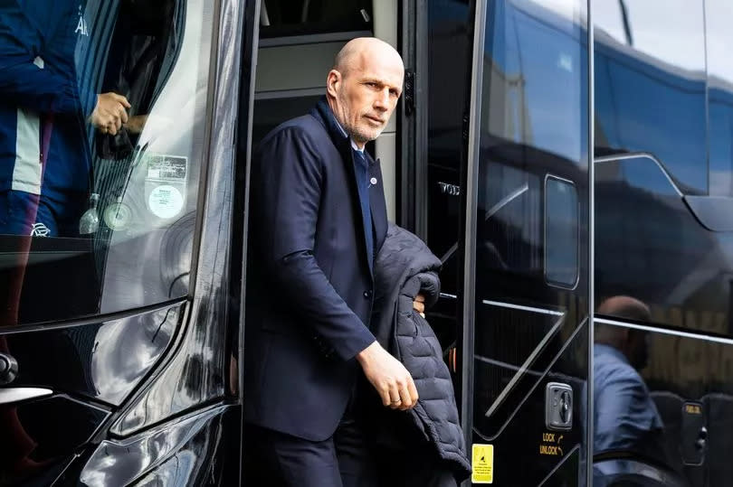 Rangers boss Philippe Clement leads the team off the bus at Dingwall