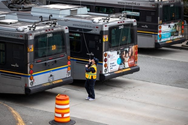 A TransLink employee at its bus depot in Vancouver in  April 2020 when hundreds of workers received layoff notices due to the pandemic.