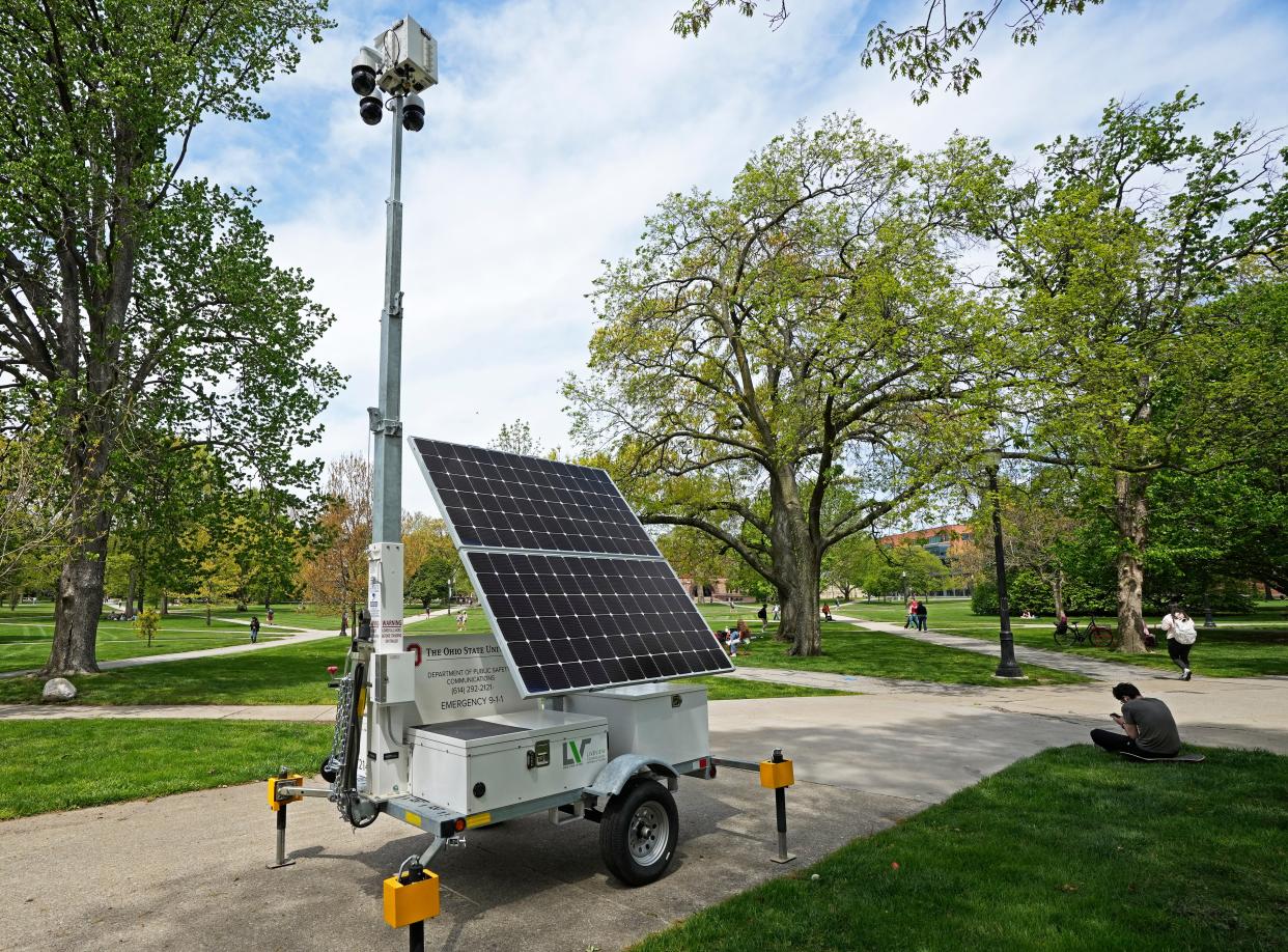 The Ohio State University main campus in Columbus was quiet on Friday with many students enjoying the beautiful spring temperatures in the 70s and studying or taking finals. Mobile security cameras and banks of lights remained around the South Oval where 36 people were arrested Thursday night at an anti-Israel protest.