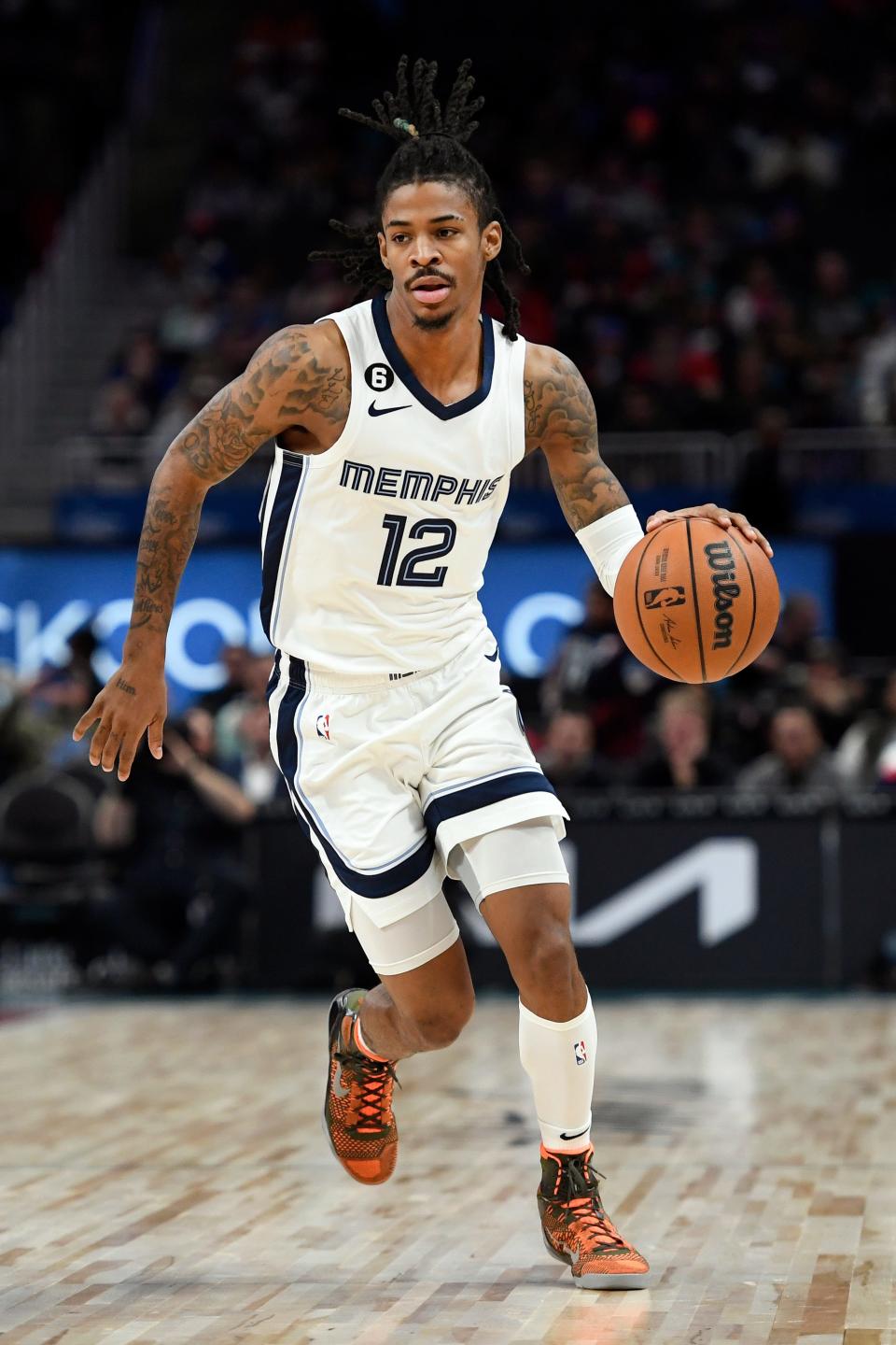 Memphis Grizzlies guard Ja Morant dribbles against the Detroit Pistons during the first half of an NBA basketball game, Sunday, Dec. 4, 2022, in Detroit. (AP Photo/Jose Juarez)