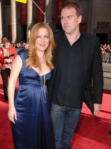 <p>Steve Granitz/WireImage</p> Gillian Anderson and Mark Griffiths at the Mann's Grauman Chinese Theatre on July 23, 2008 in Hollywood, California.