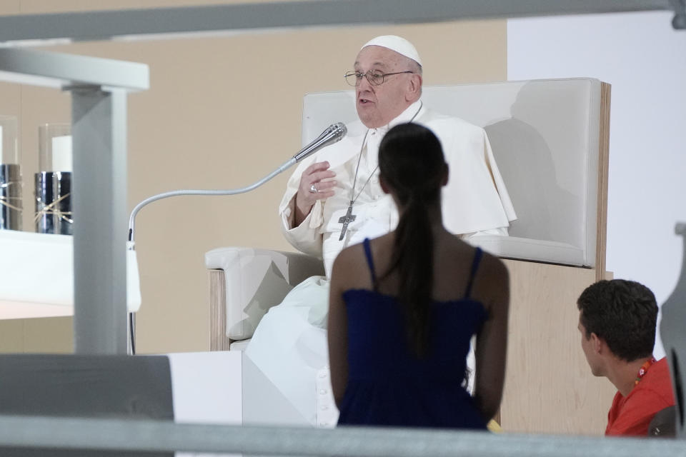 Pope Francis speaks to a crowd of hundreds of thousands gathered at the Parque Tejo in Lisbon, Saturday, Aug. 5, 2023, for a vigil ahead of the 37th World Youth Day. On Sunday morning, the last day of his five-day trip to Portugal, Francis is to preside over a final, outdoor Mass on World Youth Day – when temperatures in Lisbon are expected to top 40 degrees C (104F) – before returning to the Vatican. (AP Photo/Gregorio Borgia)