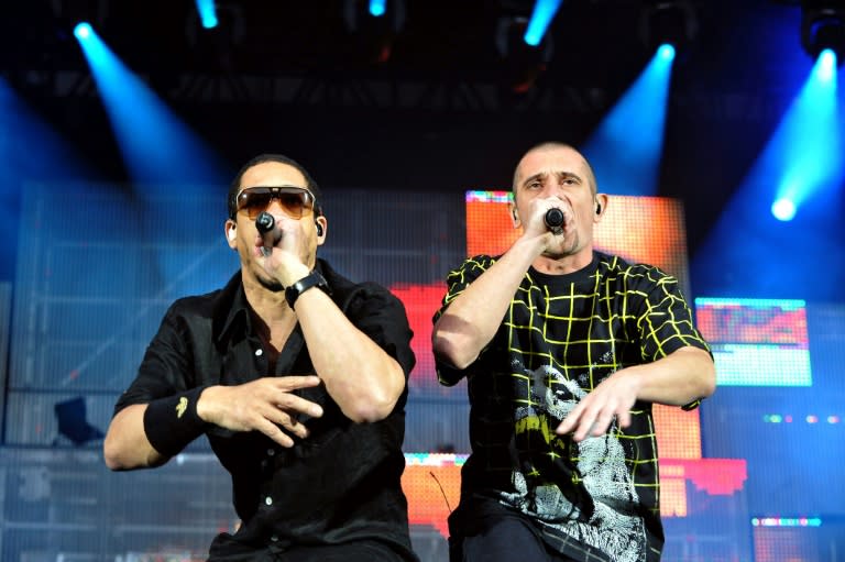 Supreme NTM singers Didier Morville, aka Joey Starr (L), and Bruno Lopez, aka Kool Shen perform in Paris in 2010