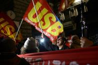 Supporters of a "No" vote in Italy's constitutional referendum celebrate near the Palazzo Chigi in Rome on December 5, 2016