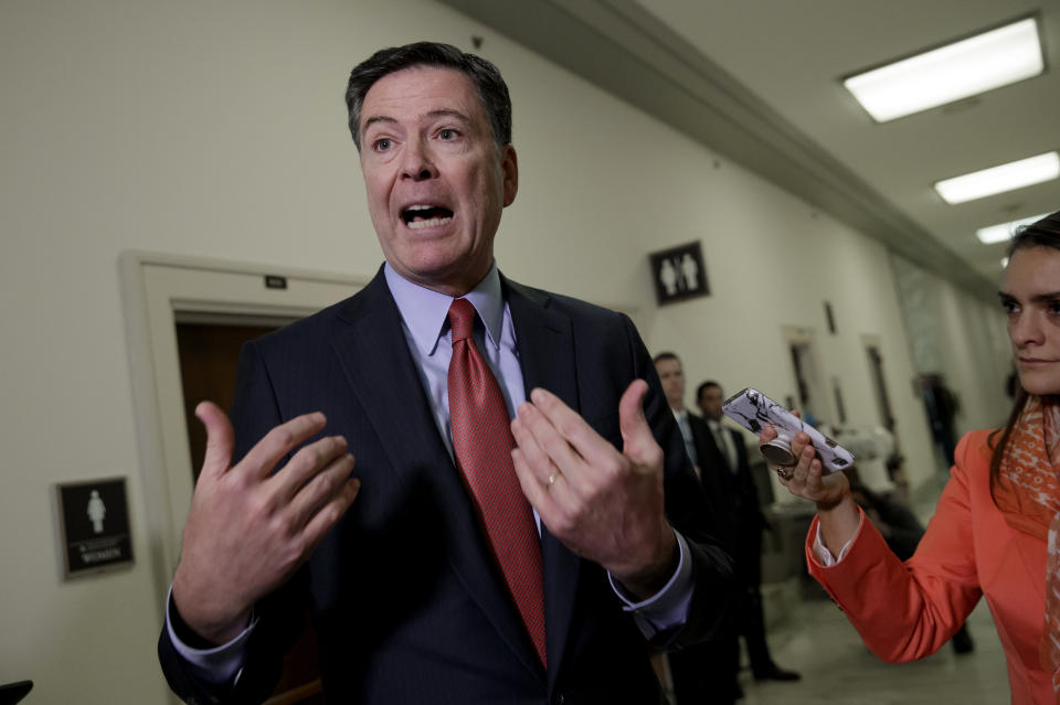 Former FBI Director James Comey speaks to reporters on Capitol Hill Washington, Monday, Dec. 17, 2018, after a second closed-door interview with two Republican-led committees investigating what they say was bias at the Justice Department before the 2016 presidential election. (AP Photo/J. Scott Applewhite)