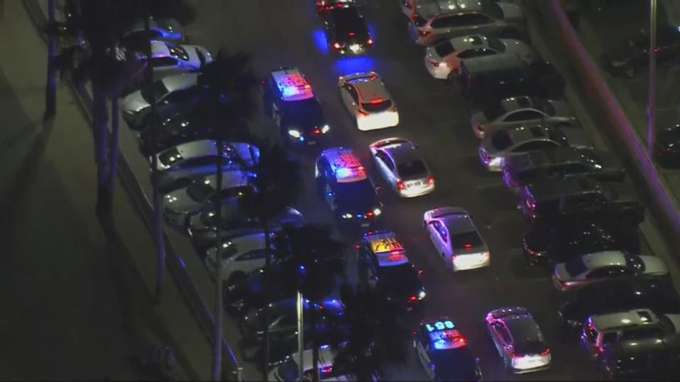 This aerial screenshot provided by FOX 11 KTTV shows Huntington Police on patrol in Huntington Beach, California.