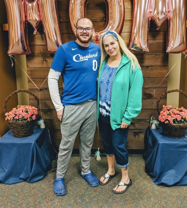 Max Emerson stands next to his mom, Chandra, on Mother's Day at their church.