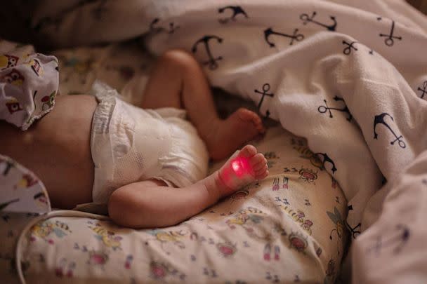 PHOTO: Baby Illiusha rests inside Pokrovsk maternity hospital, Donetsk region, eastern Ukraine, June 28, 2022. (Marko Djurica/Reuters)