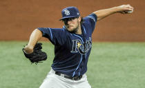 Tampa Bay Rays starter Josh Fleming throws to a Texas Rangers batter during the fourth inning of a baseball game Wednesday, April 14, 2021, in St. Petersburg, Fla. (AP Photo/Steve Nesius)