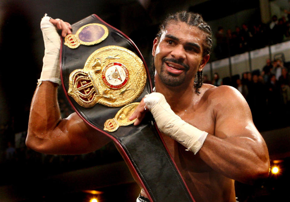 England's David Haye celebrates becoming the new WBA World Heavyweight Champion by lifting up the belt after his points win against Nikolai Valuev in the WBA World Heavyweight Title bout at the Nuremberg Arena, Germany. 