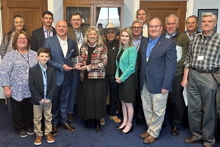 CMA President & OCM Secretary Marty Irby presents Rep. Titus with the Competitive Markets Leadership Award alongside Rudy Arredondo, the Founder & President of Latino Farmers and Ranchers International, and other CMA and OCM Members and Directors