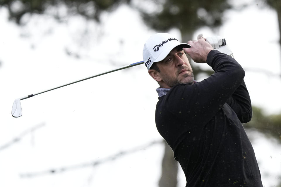 Aaron Rodgers hits his tee shot on the second hole during the first round of the AT&T Pebble Beach Pro-Am golf tournament at Spyglass Hill Golf Course. Mandatory Credit: Ray Acevedo-USA TODAY Sports