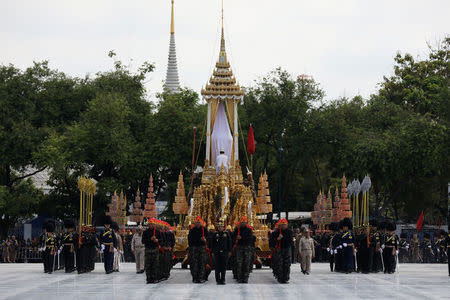 Officials take part during a funeral rehearsal for late Thailand's King Bhumibol Adulyadej near the Grand Palace in Bangkok, Thailand, October 15, 2017. REUTERS/Athit Perawongmetha