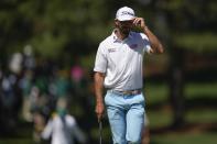 Max Homa greets the patrons on the seventh hole during second round at the Masters golf tournament at Augusta National Golf Club Friday, April 12, 2024, in Augusta, Ga. (AP Photo/Ashley Landis)