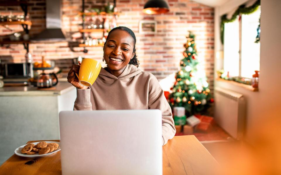 With the internet, you can stay in contact with friends and family on Christmas day - Getty