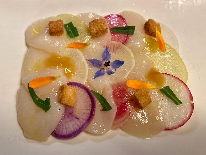 Scallop carpaccio with colorful local radishes and lemon confit