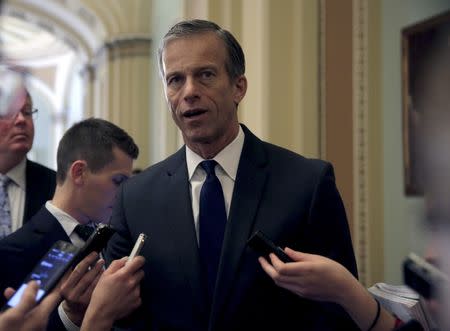 Senator John Thune (R-SD) speaks to reporters after a news conference on Capitol Hill in Washington March 8, 2016. REUTERS/Joshua Roberts