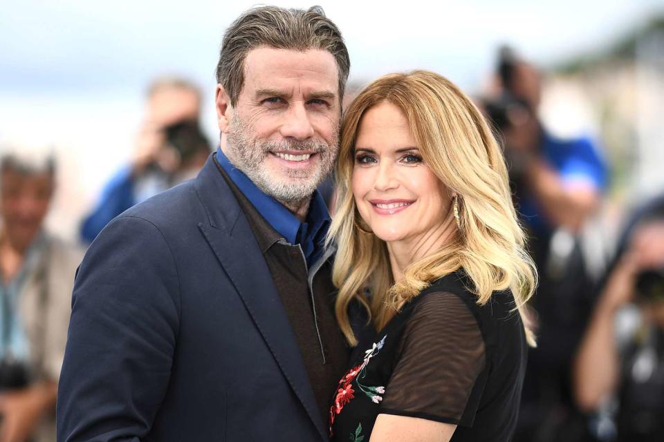 ANNE-CHRISTINE POUJOULAT/AFP via Getty Images John Travolta and Kelly Preston