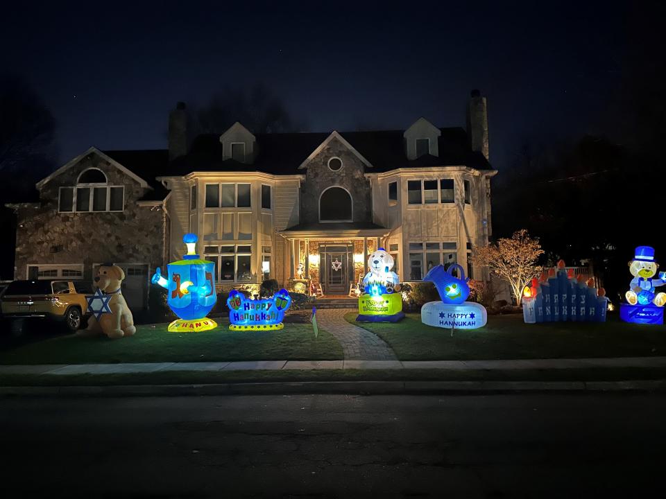 In Teaneck, Janet Hod expanded her annual Hanukkah display and put it up earlier than usual this year, in response to local protests over the Israel-Hamas war. "I want to show everyone that even if we are different, we can live together," she said.