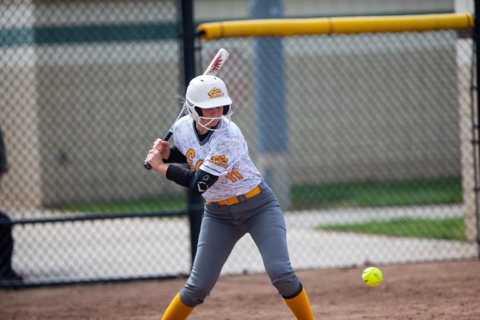 East's Katie Carlson watches the ball Tuesday, April 25, 2023, at Zeeland East. 