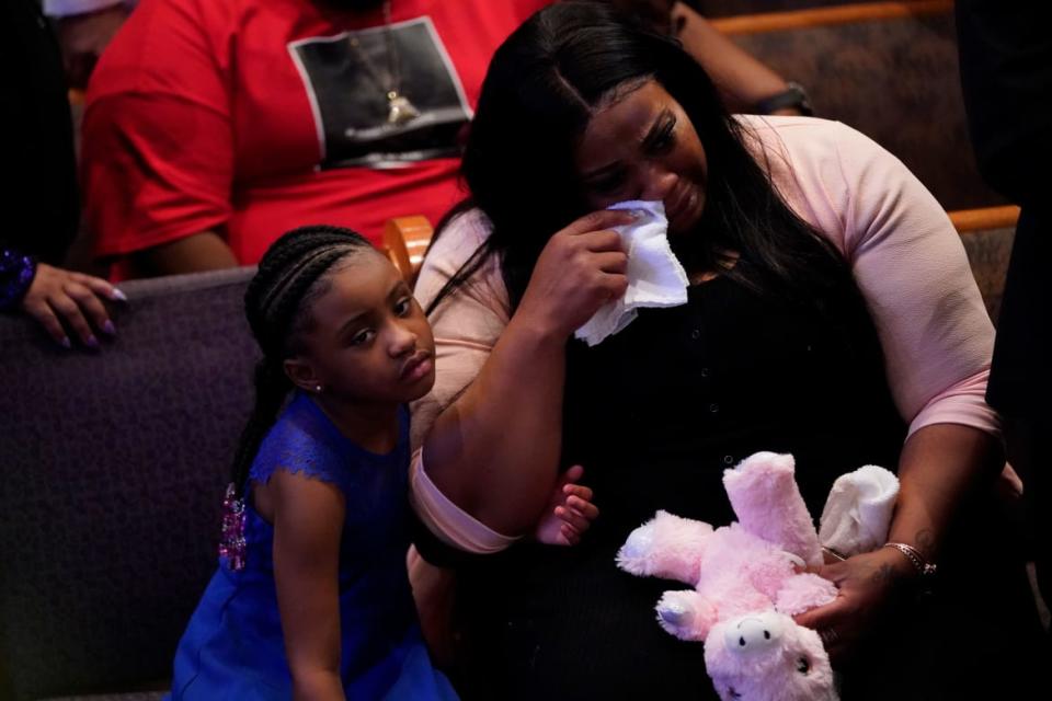 <div class="inline-image__title">1218885885</div> <div class="inline-image__caption"><p>Roxie Washington holds Gianna Floyd, the daughter of George Floyd as they attend the funeral service.</p></div> <div class="inline-image__credit">David J. Phillip/Getty</div>