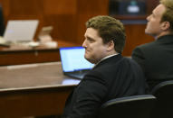 Dewayne Johnson's attorney Brent Wisner reacts as the verdict is read in Johnson's case against Monsanto at the Superior Court of California in San Francisco on Friday, Aug. 10, 2018. A San Francisco jury on Friday ordered agribusiness giant Monsanto to pay $289 million to the former school groundskeeper dying of cancer, saying the company's popular Roundup weed killer contributed to his disease. (Josh Edelson/Pool Photo via AP)