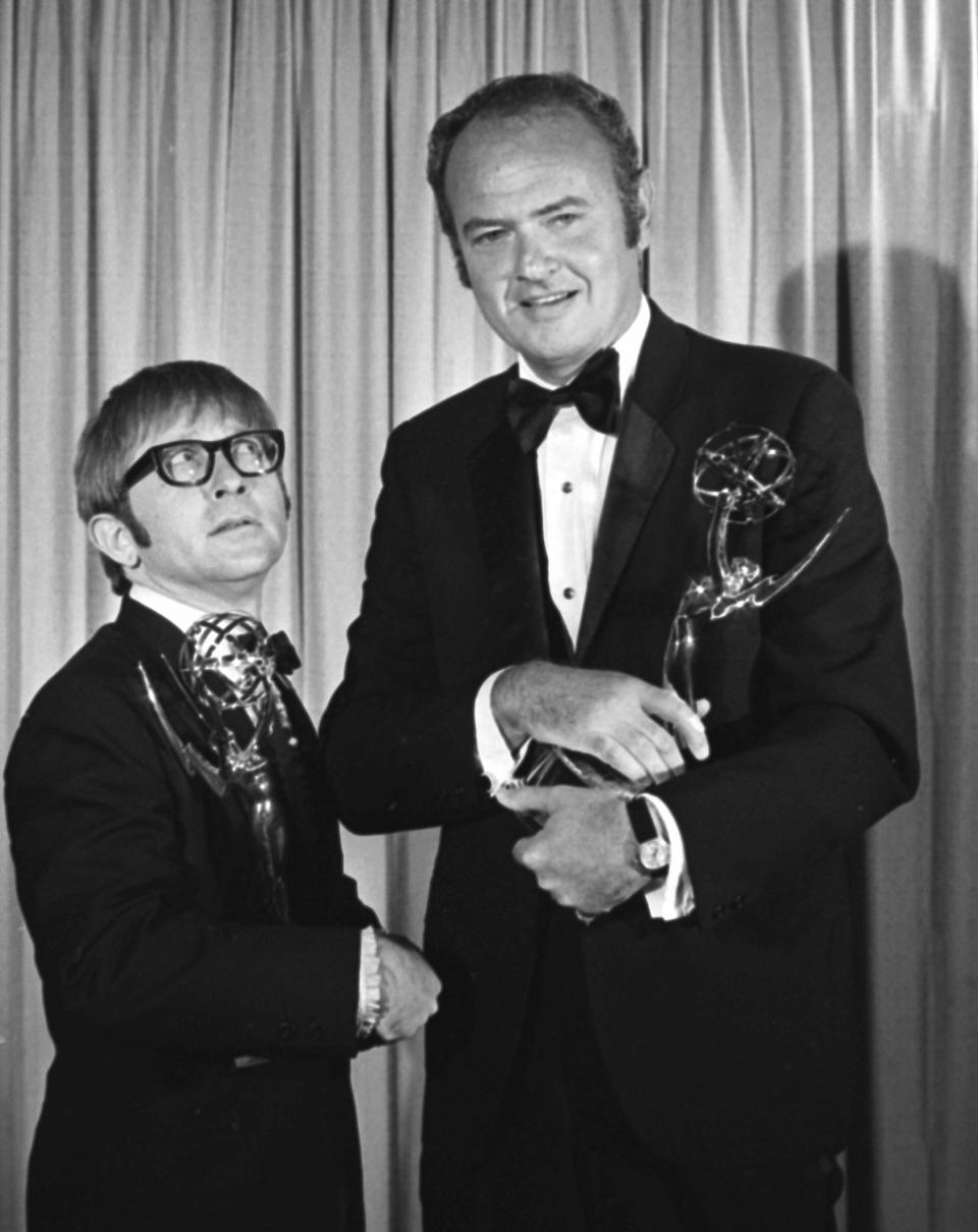 Harvey Korman, right, of "The Carol Burnett Show," and Arte Johnson, of "Rowan and Martin's Laugh-In," hold their Emmys for Outstanding Individual Achievements for a Variety Performance at the Emmy Awards in Los Angeles on June 8, 1969. Johnson died of heart failure in Los Angeles on July 3. He was 90. (AP Photo)