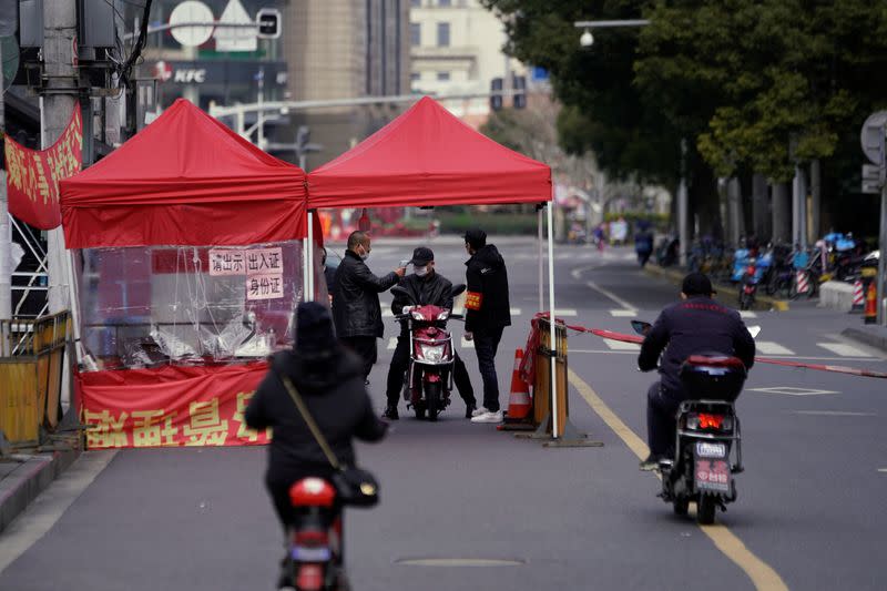 A checkpoint is seen in Qibao, an old river town on the outskirts of Shanghai