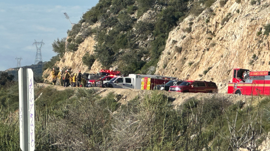 Crews respond after a vehicle went over the side of Angeles Crest Highway on April 30, 2024.