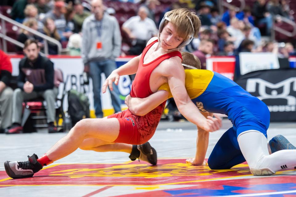 Northwestern's Sebastian Chiesa (left) wrestles Chestnut Ridge's Brock Holderbaum in a 121-pound preliminary round bout at the PIAA Class 2A Wrestling Championships at the Giant Center on March 9, 2023, in Derry Township. Chiesa won by decision, 8-4.
