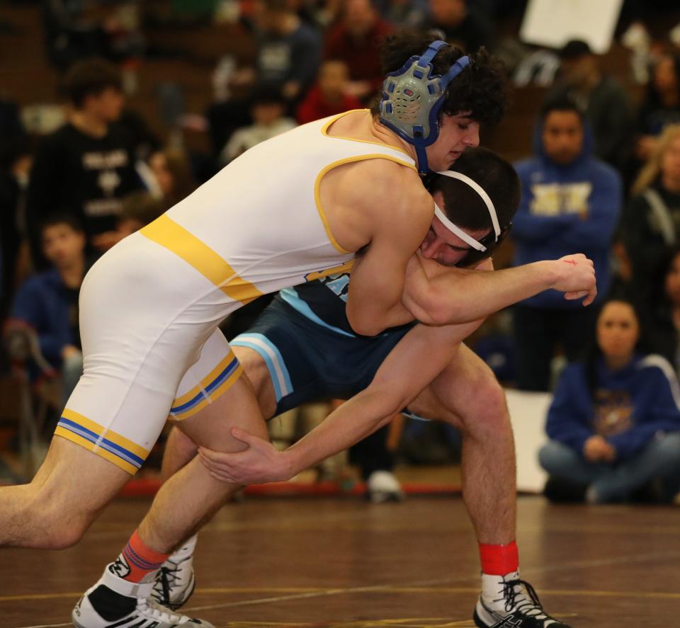 Nicholas Greco from Mahopac on his way to defeating Evan Rossi from John Jay EF in the 160 pound match during the wrestling divisional at Clarkstown South High School in West Nyack, Feb. 3, 2024.