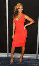 <b>Beyonce </b><br><br>Jay-Z's wife flaunted her figure in an orange Antonio Beradi dress and Jimmy Choo heels at the Super Bowl press conference in New Orleans.<br><br>Image © Rex