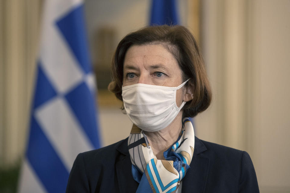 French Defense Minister Florence Parly, looks on as she is waiting to meet with Greek Prime Minister In Athens on Monday Jan. 25, 2021. Greece signed a 2.3 billion euro ($2.8 billion) deal with France Monday to purchase 18 Rafale fighter jets to address tension with neighbor Turkey. (AP Photo/Petros Giannakouris)