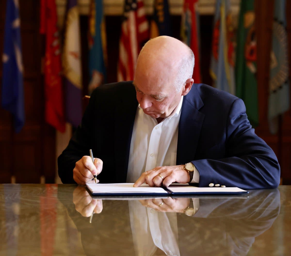 Republican Gov. Greg Gianforte signs a law on 17 May, 2023, which will ban TikTok in the state of Montana from January 2024  (AP)