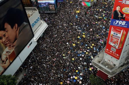 FILE PHOTO: Anti-extradition demonstrators march to call for democratic reforms, in Hong Kong