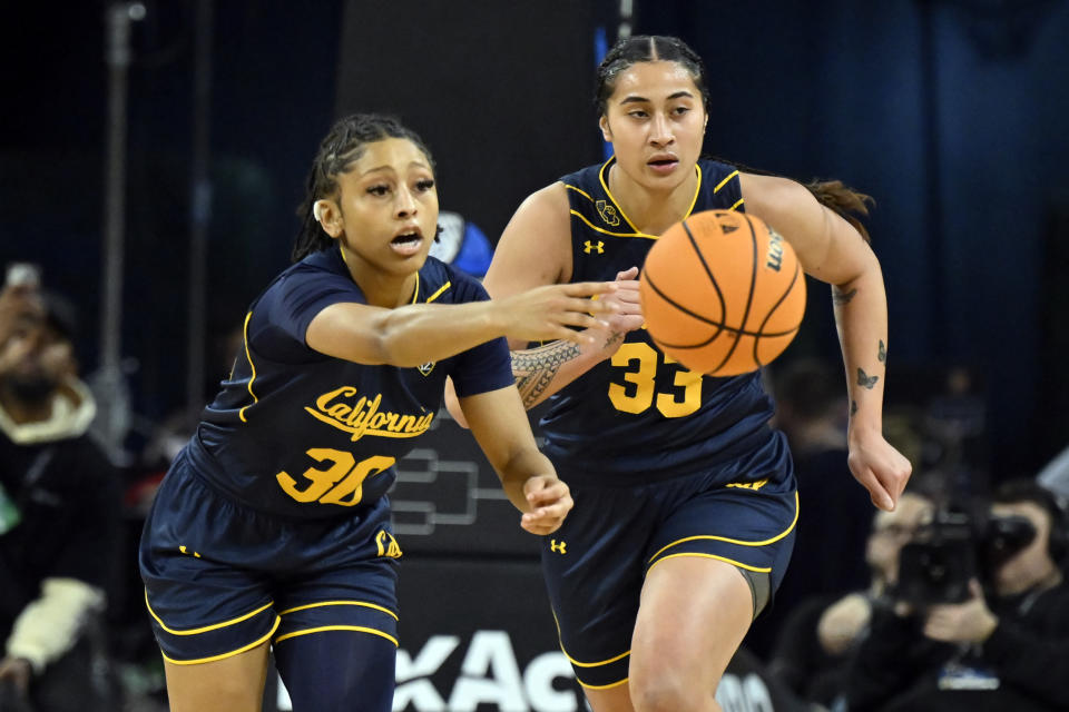 California guard Jayda Curry (30) and forward Peanut Tuitele (33) chase for the ball during the first half of an NCAA college basketball game against Washington State in the first round of the Pac-12 women's tournament Wednesday, March 1, 2023, in Las Vegas. (AP Photo/David Becker)