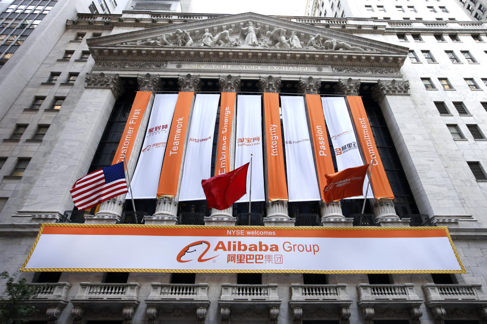 Alibaba banners hang outside the New York Stock Exchange on the day of the company's initial public offering, Friday, Sept. 19, 2014 in New York. The Chinese e-commerce giant goes public Friday in a record busting share sale. (AP Photo/Jason DeCrow)