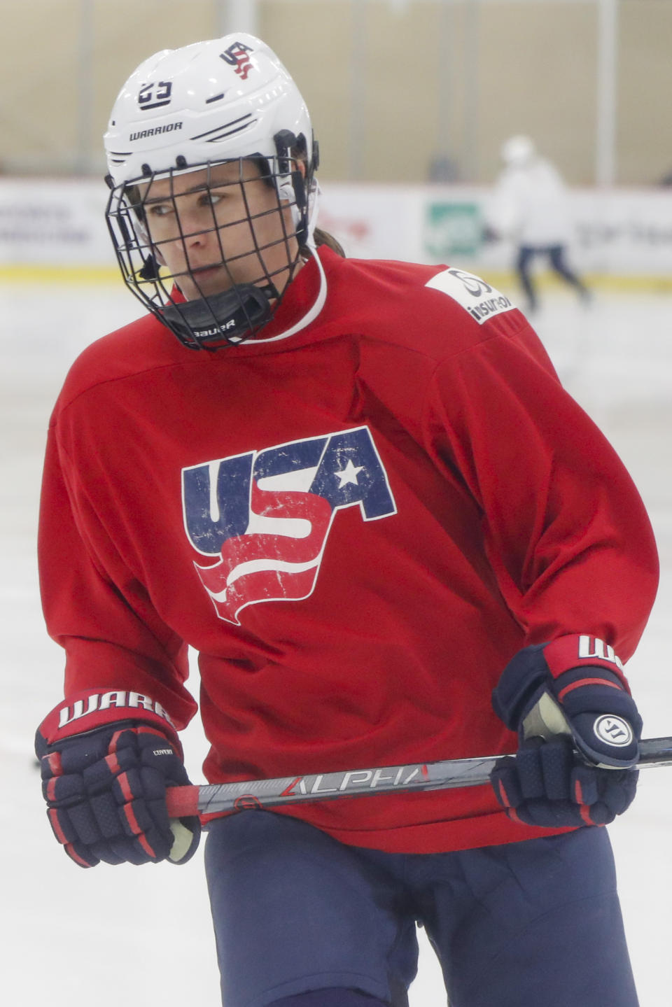 In this Monday, Nov. 4, 2019, photo, Alexandra Carpenter goes through drills while playing with the U.S. Women's National hockey team in Cranberry Township, Butler County, Pa., ahead of scheduled exhibition games against Canada. Carpenter, college hockey's top player in 2015 and daughter of former NHL star Bobby Carpenter, is also leading Russia's Women's Hockey League in scoring while playing for the Chinese-based Shenzhen KRS Vanke Rays. (AP Photo/Keith Srakocic)