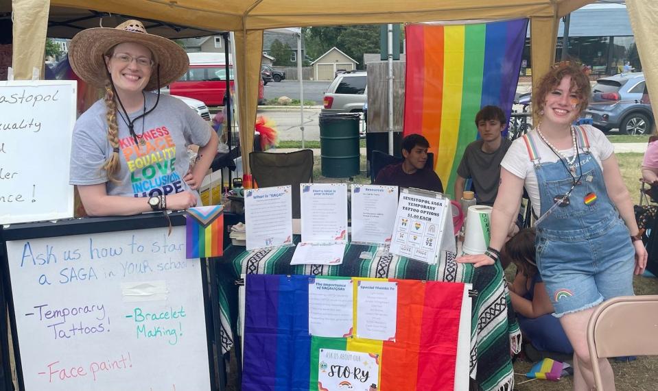 Lynn Kotte and Bianca Delarwell provide information on SAGA, a student-led sexuality and gender awareness group, during last year's Open Door Pride Fest in Sturgeon Bay. This year's Pride Fest offers games, activities, vendors, information, a drag show, music and more June 24.
