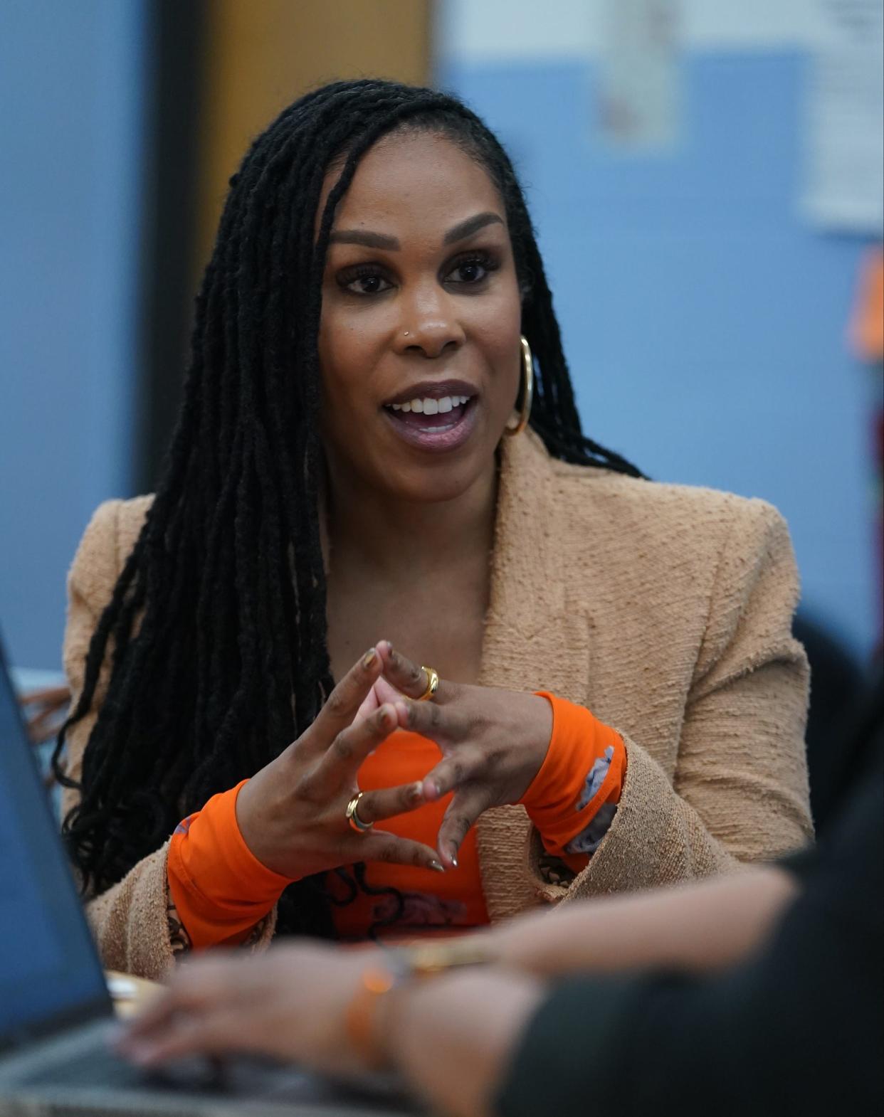 Dr. Uché Blackstone, founder and CEO of Advancing Health Equity, engaging with healthcare and related organizations around bias and racism in healthcare, speaks during an event at the Grinton I. Will Library in Yonkers on Saturday, April 20, 2024.