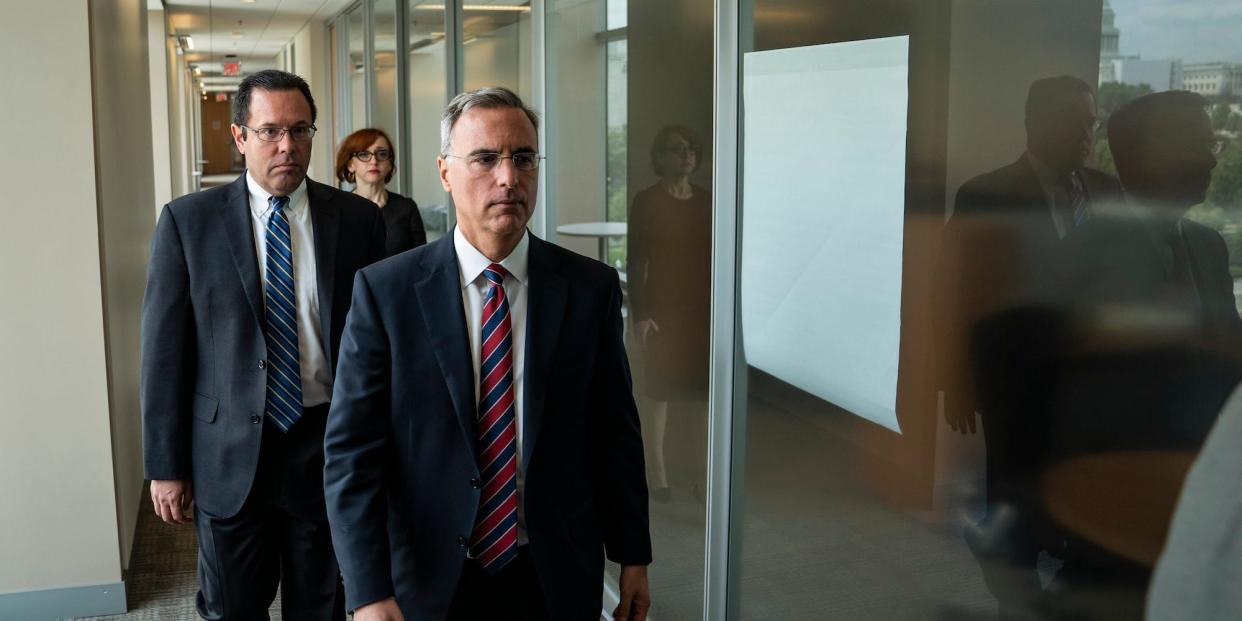 Pat Cipollone, the former White House counsel under President Donald Trump, walks during a break as he speaks behind closed doors with investigators on July 08, 2022.